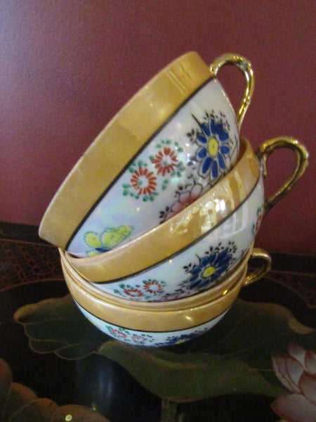 Vintage Black and Gold Musical Teapot with Floral Design
